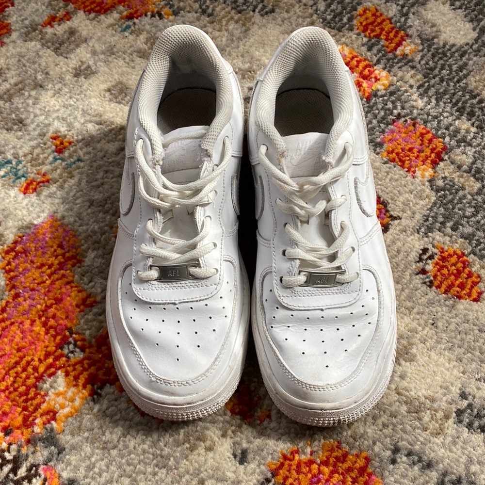 Beat up white Air Force ones